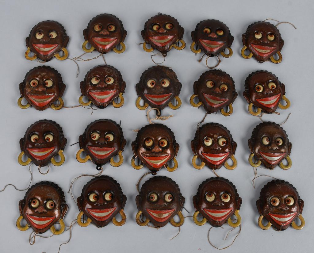 20-Golliwog Tin String Pull Toys,: most in very good condition