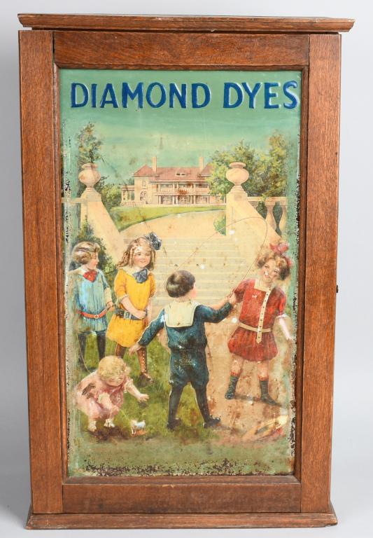 Diamond Dyes Country Store Cabinet: Nice original wood cabinet with tin advertising on door. Very nice colors and patina. 24"x15" Excellent