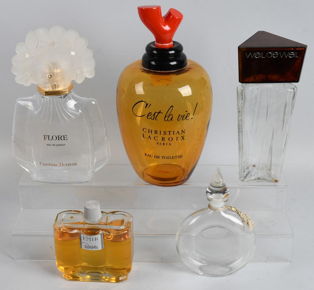 5- STORE DISPLAY PERFUME BOTTLES: Includes Cest le vie, Weil de Weil, Emir, Flore, and oe with no label. Largest 15" Excellent