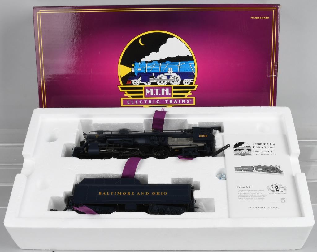 BOXED MTH 4-6-2 BALTIMORE & OHIO ENGINE &TENDER: This is an extremely detailed set produced by Mikes Train House. It is a die cast set in royal blue with Baltimore & Ohio logo. It is intricately detailed and features; Die-Cast Boiler and Chassis, Di