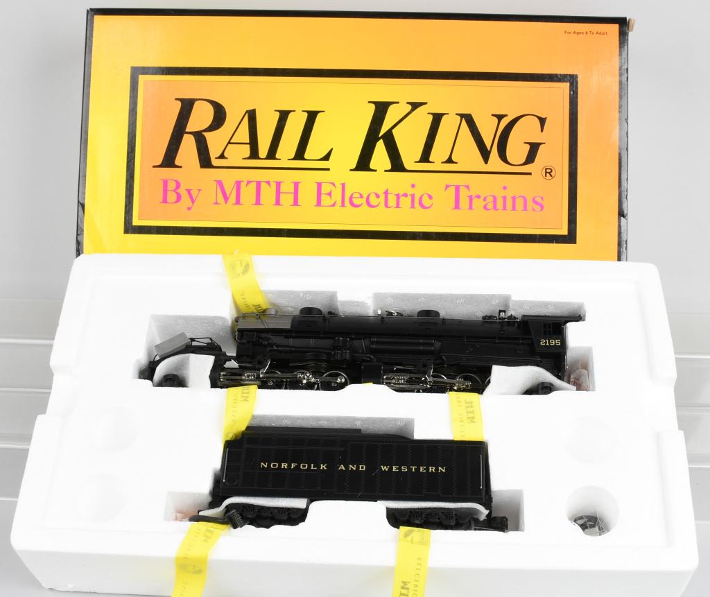 BOXED MTH NORFOLK & WESTERN 2-8-8-2 STEAM ENGINE: Set 30-1163-0 features a die-cast boiler and tender, die-cast metal drivers, metal handrails, decorative whistle, two precision flywheel-equipped motors operating headlight,metal wheels and gears oper