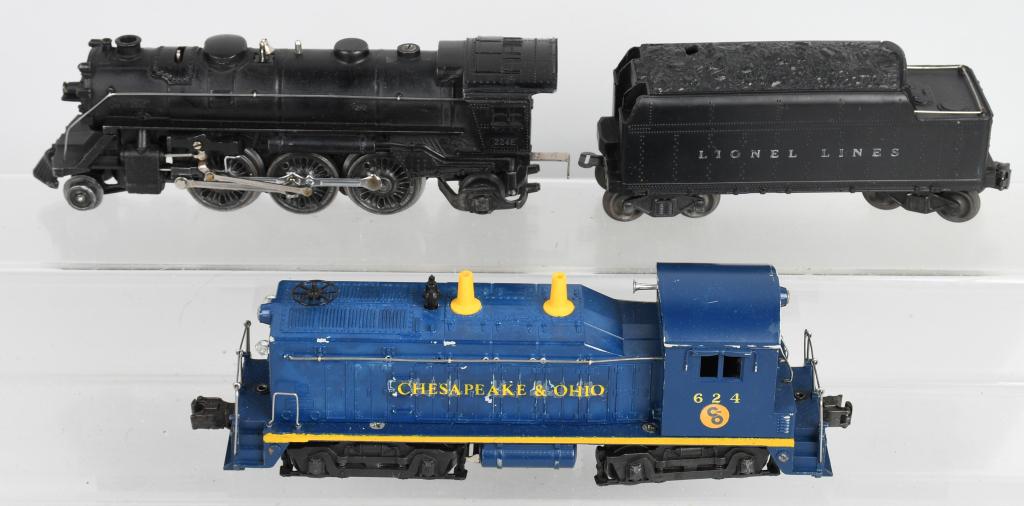 LIONEL ENGINE LOT: Lionel O-Gauge. Lot includes 624 C&O NW2 switcher engine, 2224E steam engine and 2466W tender has flying shoe trucks. Excellent