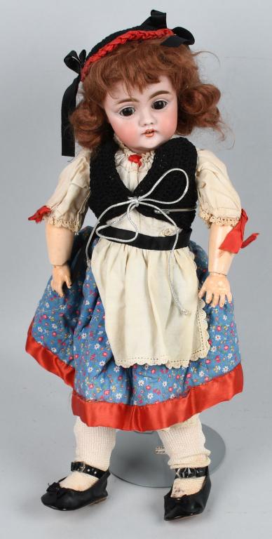 GERMAN BISQUE DOLL D-8: Attractive German bisque doll with socket head and ball jointed composition body. Doll measures 16", and has brown sleep eyes, open mouth with shaded lips and 2 teeth, shaded nostrils, and brush strok