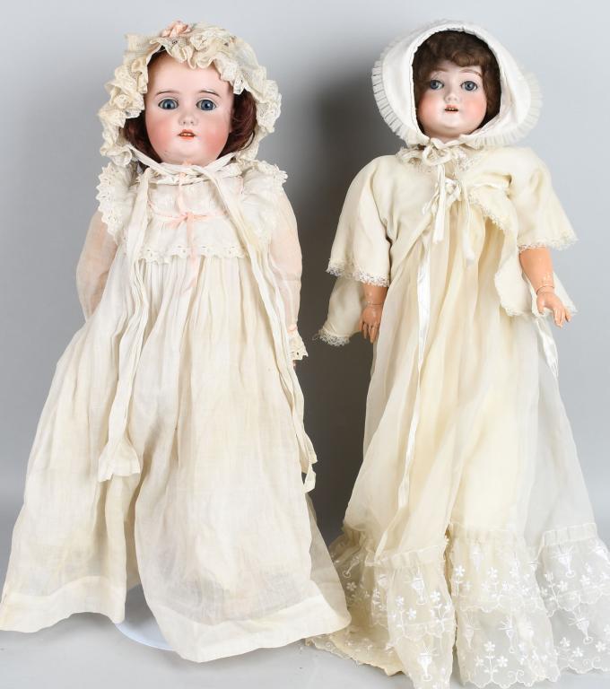 2- GERMAN BISQUE DOLLS: Lot includes 26" socket head doll marked "Q 165 K" for Gebruder Kuhnlenz. Thedoll has a nice face, but there is glue residue. Also the eyes are loose and rags have been stuffed in head to hold them in