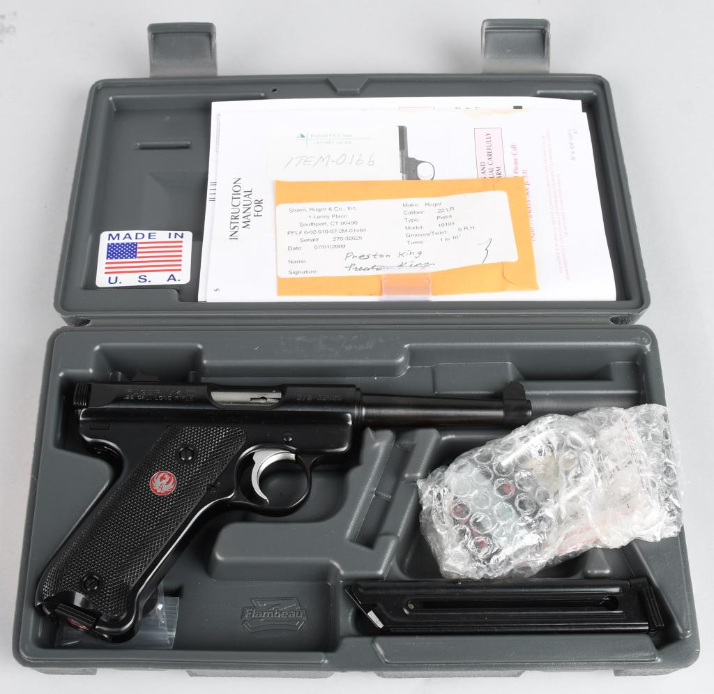 BOXED RUGER MK III SEMI-AUTOMATIC PISTOL: Serial #270-32625. Barrel length 4 3/4". Caliber .22 Rimfire. Standard blued model with black plastic grips with red eagles. As new condition in matching plastic box with two magazines and paperwork. 