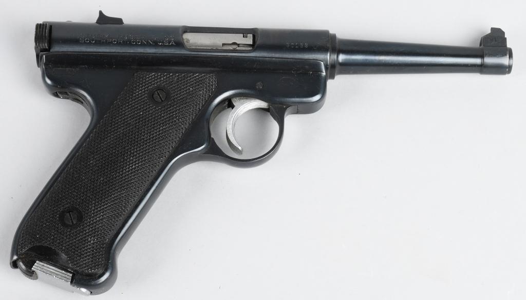 RUGER SEMI AUTOMATIC .22 PISTOL (1954): Serial #80183. Barrel length 4 3/4". Caliber .22 lr. Made 1954. Blue finish with standard sights, one magazine, black eagle black plastic grips. Gun retains at least 98% original factory blue finish. 