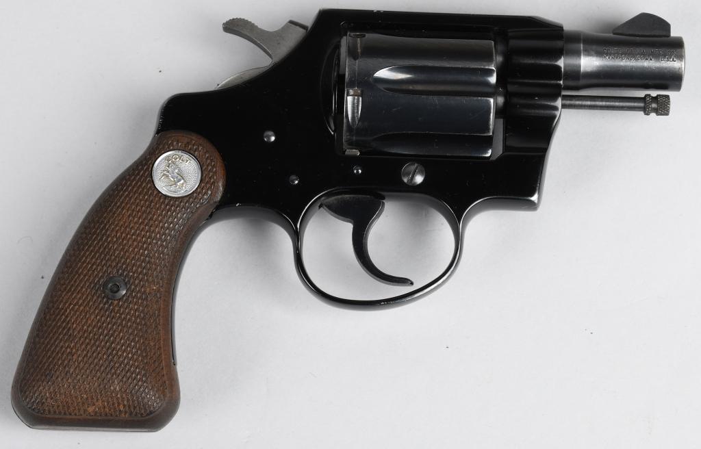 COLT COBRA DOUBLE ACTION REVOLVER: Serial #265934 LW. Barrel length 2". Caliber .38 special. Made in 1968. The Cobra features the alloy frame, blue finish, round butt, short grip frame and checkered walnut grips. Barrel has high edge w