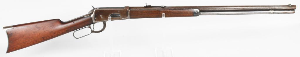 FIRST YEAR WINCHESTER MODEL 1894 .32-40 RIFLE: Serial # 4071. Barrel length 26". Caliber 32-40.Made 1894. This first year rifle features a full octagon barrel, full magazine,German nickel front sight, Winchester semi-buckhorn rear sight, blue fini