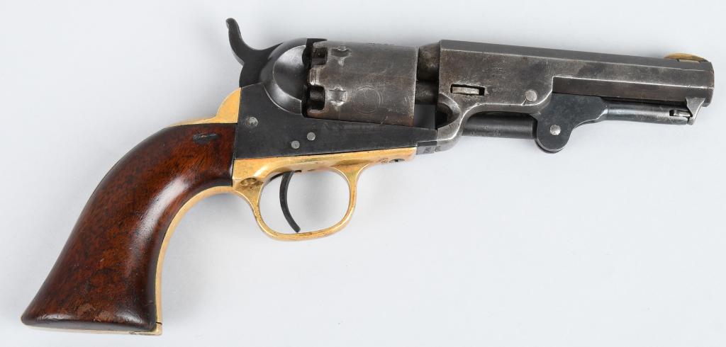 COLT MODEL 1849 POCKET PERCUSSION REVOLVER: Serial # 265911. Barrel length 4". Caliber .31. Made in 1864. Standard model with octagon barrel, blue and case color, one piece walnut grips brass trigger guard and back strap with stage coach scene
