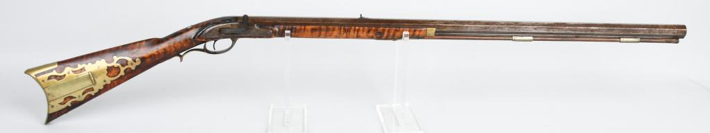 RARE EPHRAIM GILBERT MULE EAR RIFLE: NSN. Barrel length 32". Caliber .40. Made in Rochester New York from 1822-1837. The engraved lock is stamped with maker and city. Barrel is also stamped but hard to read. The half stock is beautifully