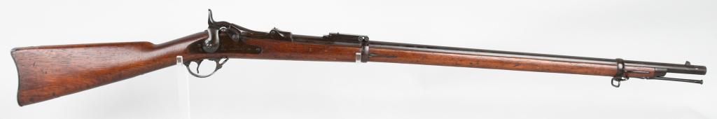 US SPRINGFIELD MODEL TRAPDOOR RIFLE: Serial #466169. Barrel length 32 5/8". Caliber .45-70. Standard US Indian Wars issue rifle. Bolt is dated 1878. Rear sight is an 1884 Buffington. Everything else is standard , walnut full stock, two b