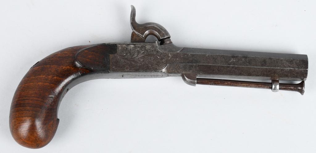 BELGIUM FOLDING TRIGGER BOOT PISTOL: Barrel length 3". Bore .45. Features an octagon barrel, round walnut bag handle, attached steel ramrod, percussion single shot with folding trigger. Frame is engraved and barrel has Belgium stamp. Gun