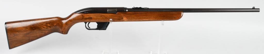 WINCHESTER MODEL 77 SEMI-AUTOMATIC RIFLE: Serial NSN. Barrel length 22". Caliber .22 long rifle. Made 1955-63. Features full blue round barrel with sporting sights, plain pistol grip walnut stock with Winchester butt plate. Barrel has light m