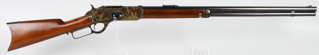 RESTORED WINCHESTER MODEL 1876 RIFLE: Serial # 4007. Barrel length 28". Caliber .45-75. Made 1878. Features a full round barrel, full magazine, knife blade front sight, ladder rear sight, walnut stocks and thumb print dust cover. Beautifu