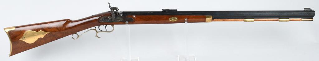 THOMPSON CENTER .45 BLACK POWDER RIFLE: Styled after the Plains rifles of the mid-19th century but updated with a target rear adjustable sight and modern steel for today's black powder hunters. Features a 28" full octagon barrel, bead front