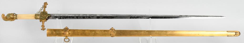 RARE PRE CIVIL WAR AMES KNIGHTS HEAD MILITIA SWORD: This Ames militia officer sword has a knights head/helmet pommel with a high plume, a 5 inch cross guard that is finely decorated. The grip is carved bone. The blade is a double edged straight blade w