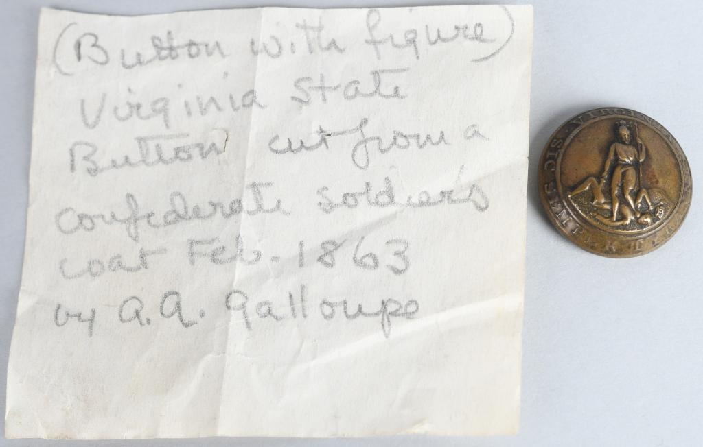CONFEDERATE VIRGINIA BUTTON, RMDC w/ PROVENANCE: Very nice undug Virginia coat size button with RMDC Scoville back mark. Has a stand up shank and uncludes a note of provenance which reads: "(Button with figure) Virginia State Button cut from a confe