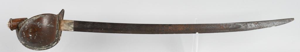 CIVIL WAR US 1860 US NAVAL CUTLASS SWORD: Pattern 1860 US Navy Cutlass sword. Has wood handle, unstopped fuller, and solid brass basket style guard. Guard is marked on the inside "7 M" and "762" and 10 rivets hold the basket to the guard. No 