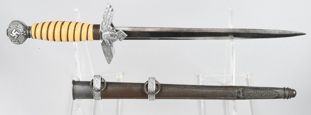 WWII NAZI GERMAN LUFTWAFFE OFFICERS DAGGER: Roughly 29cm long bright nickel/silver plated double edged drop forged steel stiletto style blade with a flat central plane. Well marked with acid etched manufacturers logo, name and location. P.D. Lu