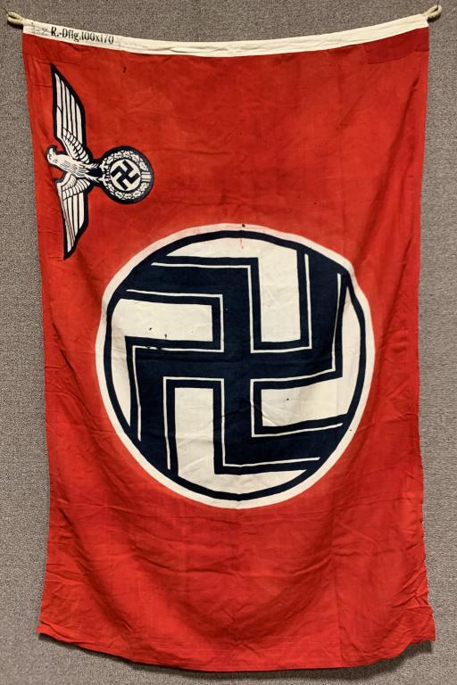 WWII NAZI GERMAN STATE SERVICE FLAG EAGLE M MARKD: A 1935 pattern double sided, printed, cotton/linen construction flag. The flag features a red base field white with a white central circular field with a black and white bordered black static swastika