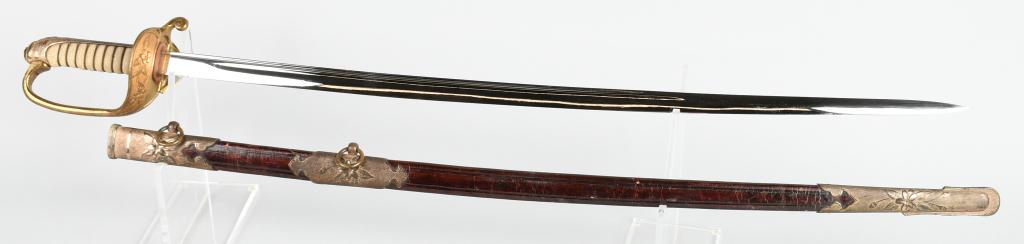 WWII JAPANESE NAVY OFFICER SWORD & SCABBARD: WWII Japanese navy Sword, 26" single fullered bright blade, original washer, perfect shark skin grip with double wire brass wrap, brass guard retains original gold wash, with folding langet. Brass mou