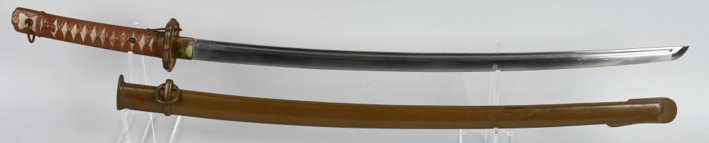 WWII JAPANESE TYPE 95 NCO SAMURAI SWORD MATCHING: Imperial Japanese Army Type 95 Shin Gunto for non-commissioned officers. The Kokura arsenal produced this sword. This sword has a cast aluminum tsuka (hilt) with a 9mm thick ornate brass tsuba (guard)