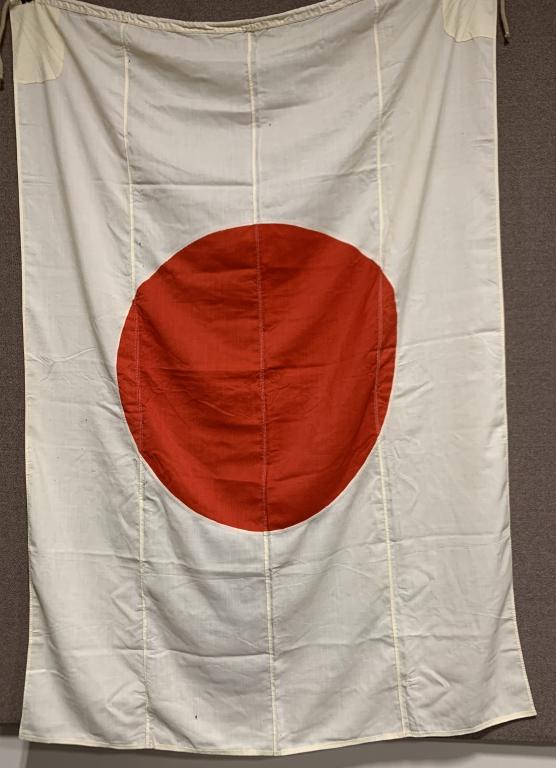 WWII JAPANESE WOOL NAVY NATIONAL FLAG HAND SEWN: This beautiful Japanese National flag example is 64 x 95 inches with reinforcements sewn to its hoist edge corners. The hoist edge has a small dual-ply reinforcement panel to each corner. The hoist ed