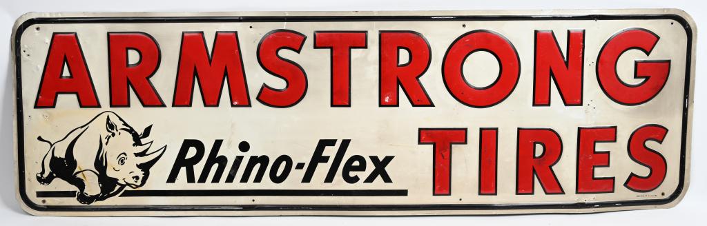 Armstrong Tires "Rhino-flex" metal sign (TAC): rated 7, 18"x60", SST embossed sign, has good color and some shine, has wear, scratches and extra nail holes at the left-hand end, marked Stout Signs, TAC #004879.