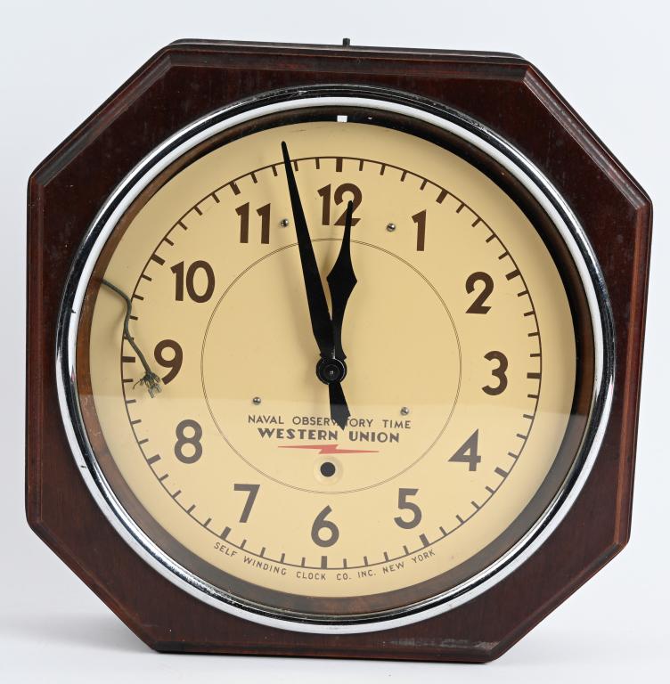 WESTERN UNION NAVAL OBSERVATORY TIME CLOCK: Made by the Self winding Clock Co. The Self Winding Clock Company clock mechanisms were truly revolutionary because the spring that powers the clock was not wound by hand but with an electric motor. T
