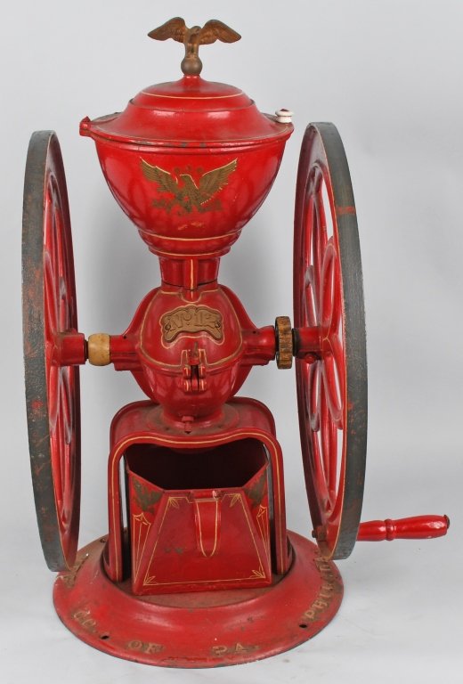 ENTERPRISE #12 COFFEE GRINDER: Excellent Enterprise #12 Coffee Grinder. All cast iron and very well made. Still has eagle finial and tin bin . Nice red paint with gold highlights. 34" Excellent