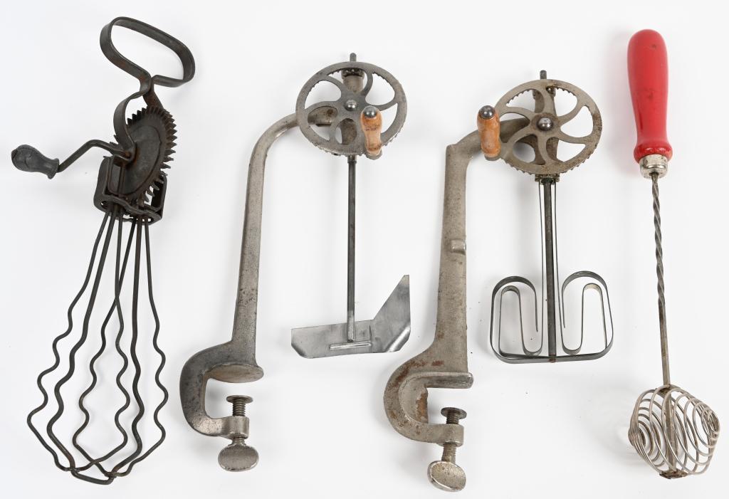 4- ANTIQUE KITCHENWARE EGG BEATERS: Lot includes 2 different cast iron clamp on beaters, a French Le Tourbillon beater patented 1921 and a retractable handle egg beater. The French beater has cracking to diecast handle. Largest is 12" v