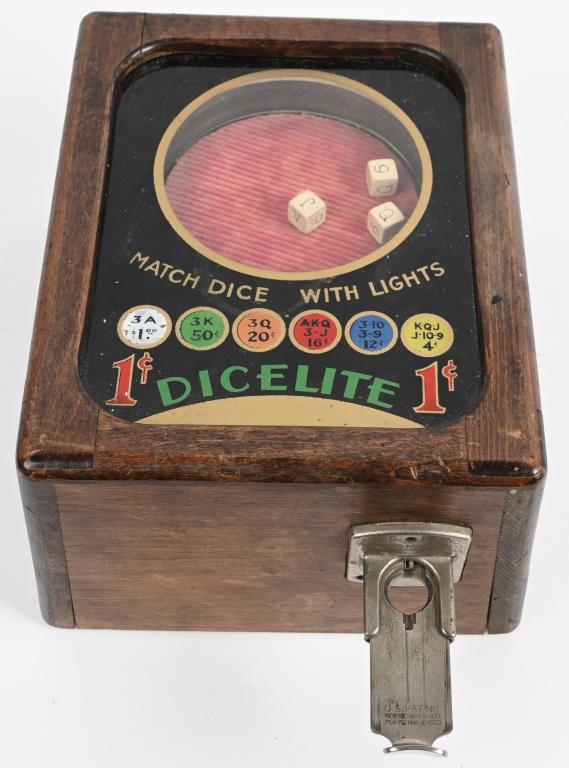 1c DICELITE TRADE STIMULATOR: An electric countertop dice game where the player aims to match the values on the dice to the illuminated values on the game board. All original. 13" Excellent