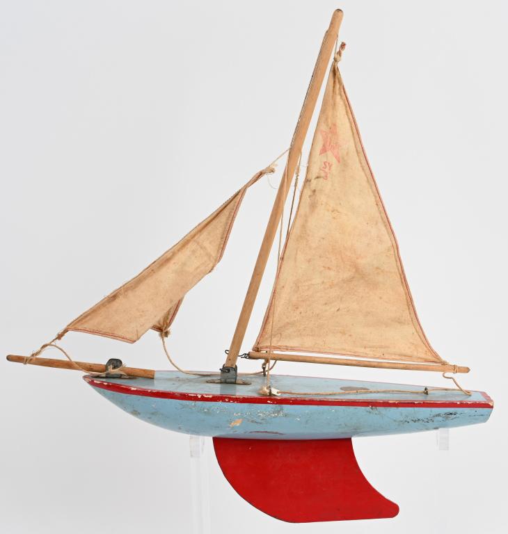 VINTAGE STAR YACHT POND SAIL BOAT: All original vinatge toy sail boat made in England. Measures about 17" by 19" with sails extended. Light wear. has original paint and decal. Very Good