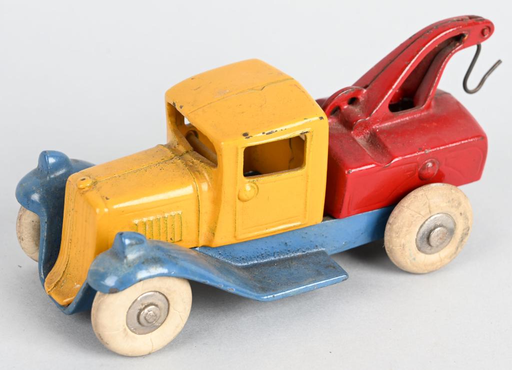 KILGORE 1930's cast iron TAKE-A-PART TOW TRUCK: All original Kilgore cast iron Wrecker Tow truck. Great multi colored castings.. No cracks or breaks. 5 1/2", Excellent