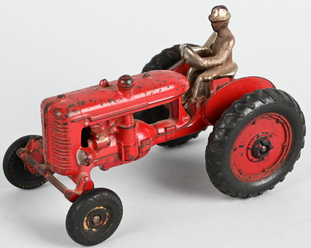 ARCADE cast iron FARMALL CULTI-VISION TRACTOR: Great looking all original tractor with no cracks or breaks. Original paint, and Culti-Vision Farmall decal on hood. Has Arcade sticker underneath. Original rubber wheels have some wear. 7 1/2". Very 