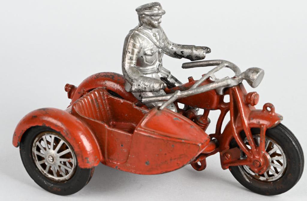 HUBLEY cast iron LARGE SIZE MOTORCYCLE & SIDECAR: The toy is an original 1930's Hubley "Generic" motorcycle and side car. This model is considered a generic as it is neither a Harley Davidson nor an Indian. The toy has been completed over painted inc