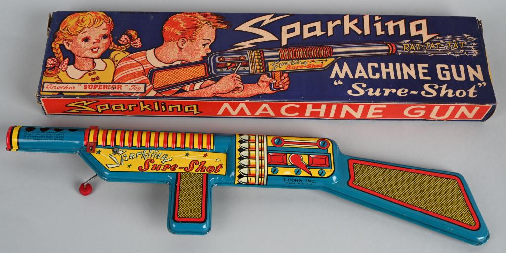 SUPERIOR SPARKLING MACHINE GUN w/ BOX: All original tin gun with great colors. Works. Boxed. 21" Excellent