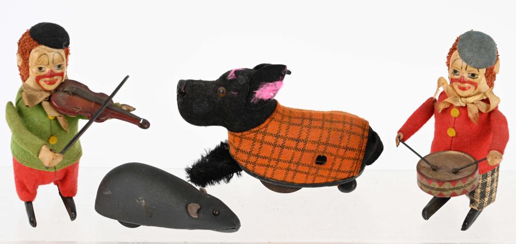 4- VINTAGE GERMAN SCHUCO tin windup TOYS: Lot includes a Clown Drummer, a Clown Violinist, a Mouse and a Scottie dog. All worked when they were tested. 4 1/2", Very Good