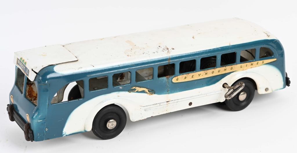 BUDDY L 1930's windup GREYHOUND BUS: Complete and original. Windup worked when tested. Lights have not been tested. 16", Very Good