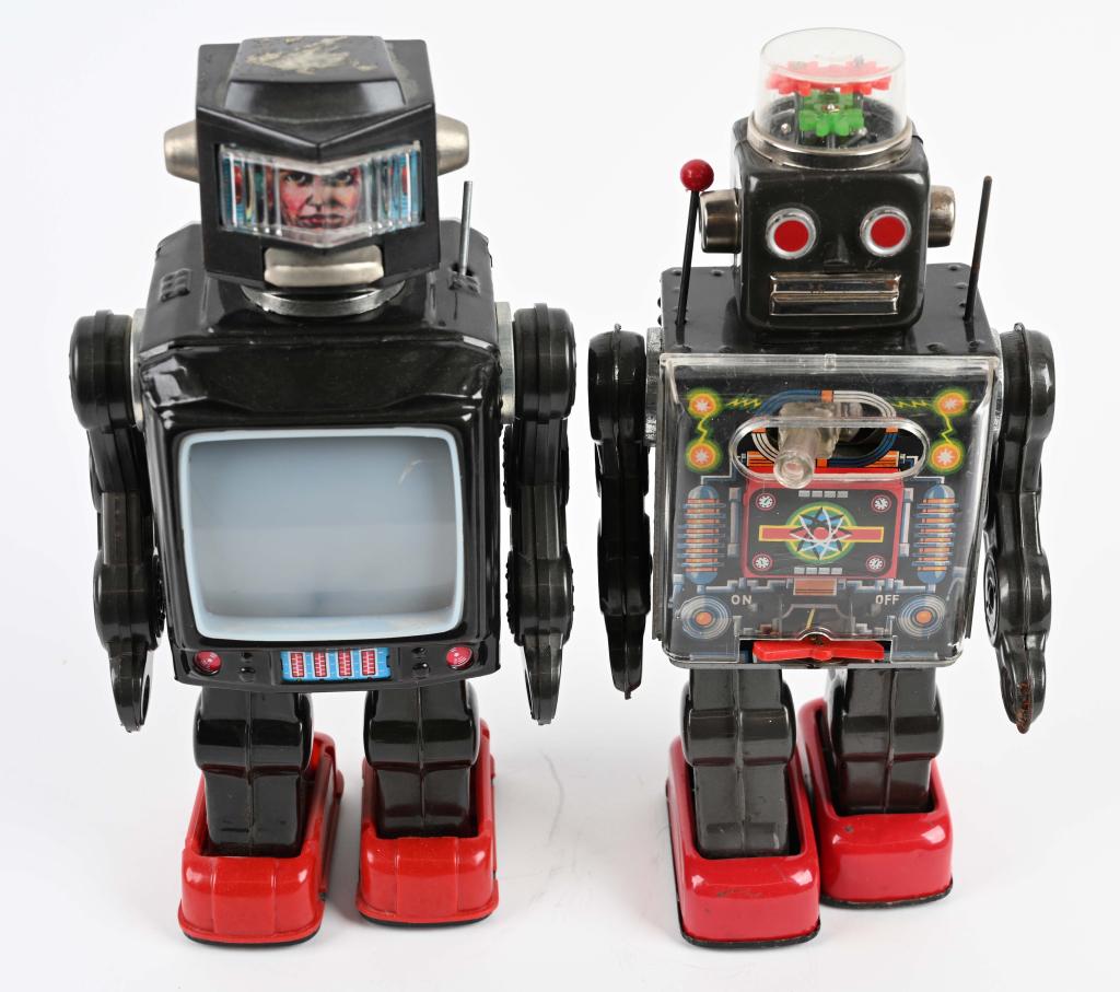 FIGHTING ROBOT & VIDEO ROBOT: Pair of vintage Robots. Both all original. Fighting Robots works. Has some corrosion in battery compartment. Video Robot did not work. Largest 11 1/2" Very Good-Excellent