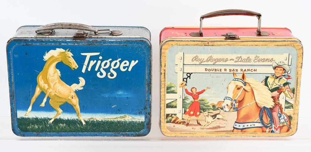 2- VINTAGE LUNCH BOXES, ROY ROGERS & TRIGGER: Lot includes a 1954 Roy Rogers with no thermos, along with a 1956 Trigger with no thermos. Both have wear, rubs and scratches. Nice graphics and colors. Very Good