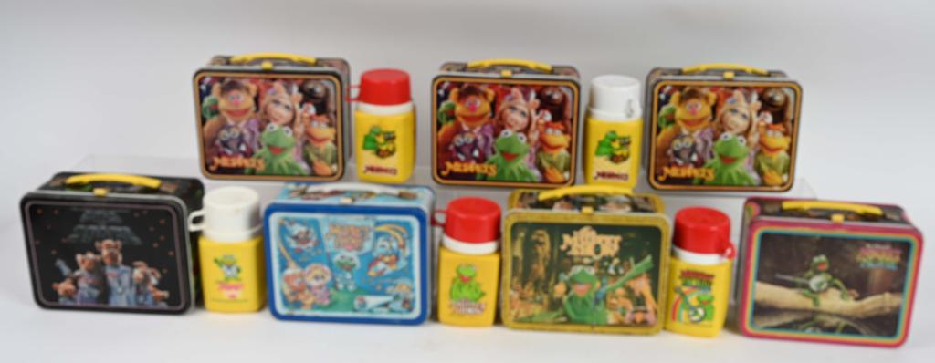 7- DIFFERENT MUPPETS LUNCH BOXES: Nice grouping of lunch boxes. All have thermos bottles, except for Pigs in Space and Fozzie Bear. Conditions vary. there is some paint loss, scratches and general wear. Good-Very Good
