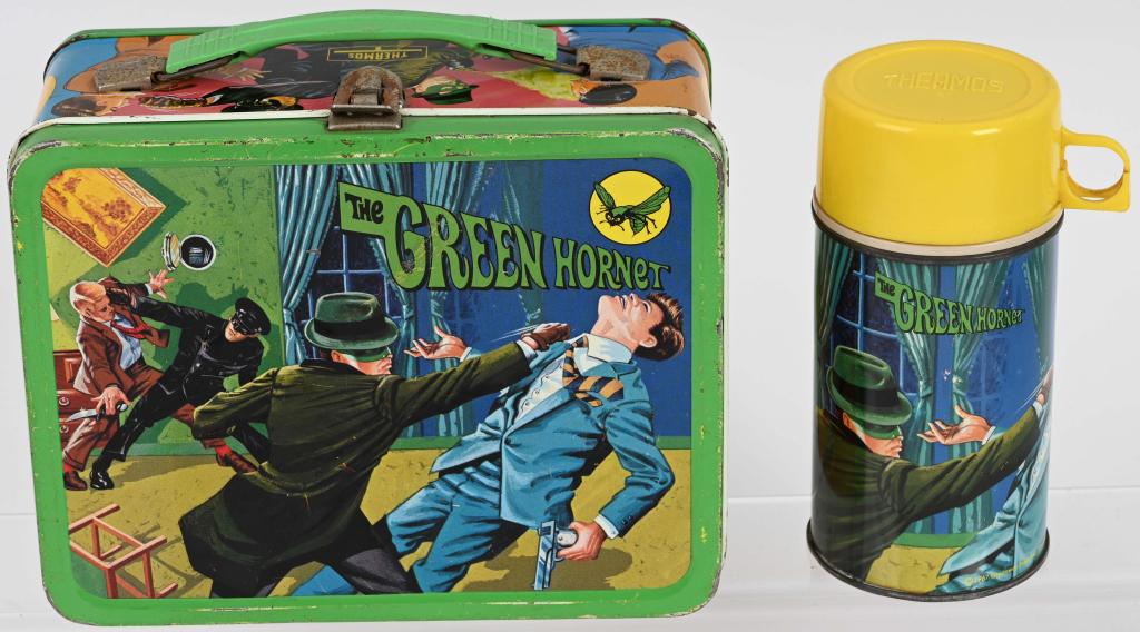 1967 THE GREEN HORNET LUNCH BOX w/ THERMOS: Nice original lunch box with the correct thermos. Has some edge wear and loss inside. Great graphics. Very Good