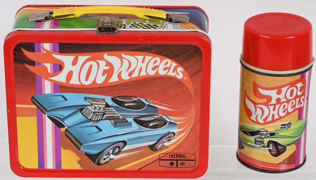 1969 MATTEL HOT WHEELS LUNCH BOX w/ THERMOS: Exterior of box has minor rubs, interior has some wear and light paint loss. Vivid colors and graphics. Excellent