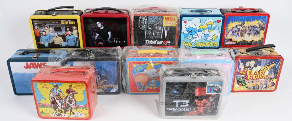 12- METAL LUNCH BOXES: Nice lot of contemporary and reproduction metal lunch boxes. Lot includes Flash Gordon, The Smurfs, Jaws, Lord of the Rings, Terminator 3, Dumbo, Friday the 13th, The Lone Ranger, Small Soldiers, Twil