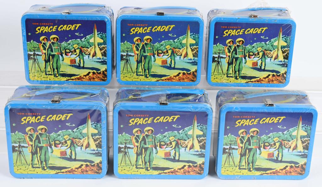 6- TOM CORBETT G. WHIZ BRAINIAKS LUNCH BOXES: Lot of contemporary 6 Tom Corbett lunch boxes still wrapped in the plastic. excellent-Near Mint