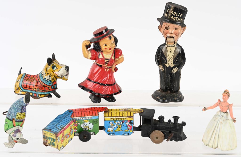 6- VINTAGE windup TOYS: Lot includes 6 vintage plastic and tin windup toys. As-Is
