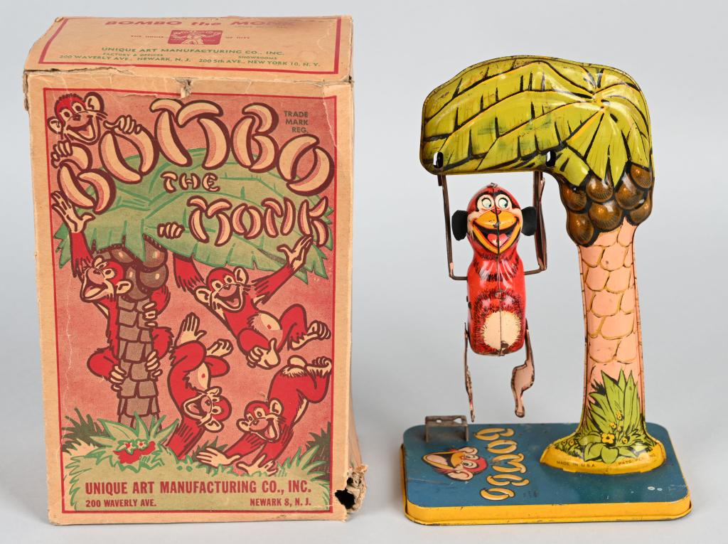 UNIQUE ART Tin Windup BOMBO THE MONKEY w/ BOX: All original and complete. Windup works. Boxed. 10" Excellent