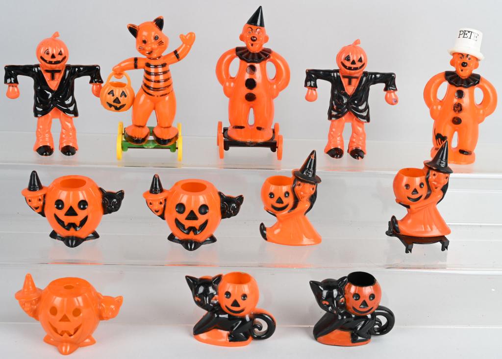 12- VINTAGE HALLOWEEN CANDY CONTAINERS: Great lot of vintage Halloween Candy Containers. Some unusual examples. Excellent