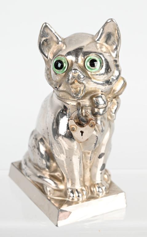 GERMAN SILVERED LEAD CAT STILL BANK: German circa 1930. Silvered lead with glass eyes. 4 1/2" Excellent